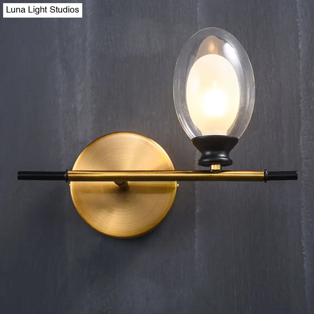 Elegant Clear/Amber Glass Egg Shape Wall Light - Minimalist 1 Brass Sconce