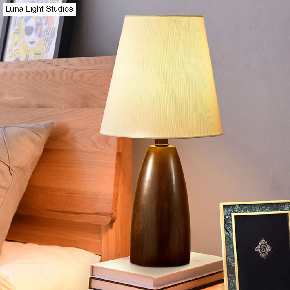 Nordic Single Bulb Brown Table Lamp With Resin Jar Night Stand And Deep Cone Fabric Shade