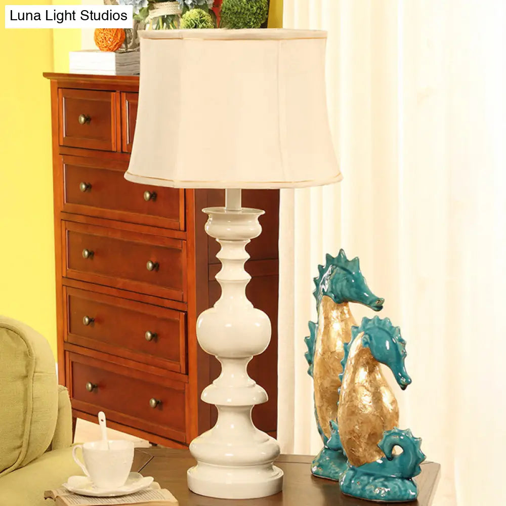 Traditional Style Fabric White Nightstand Lamp With Baluster Base And Drum Shade - 1 Light