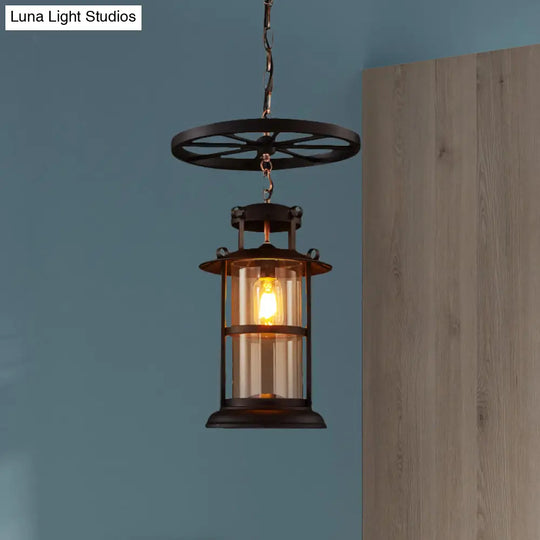 Farmhouse Black Single Light Pendant Ceiling With Clear Glass Cylinder And Iron Wheel Fixture