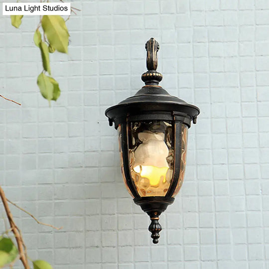 Farmhouse Clear Dimple Glass Wall Lamp - 1 Light Courtyard Lighting In Black With Curved Arm