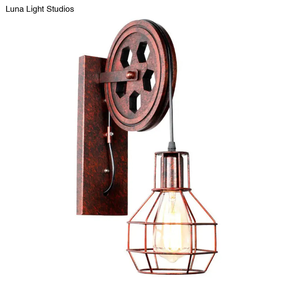 Farmhouse Iron Pulley Wall Light In Rust Red - 1-Light Ball Cage Fixture