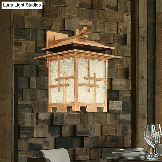 Farmhouse Outdoor Wall Lamp: 1-Light Sconce Fixture With Textured Glass Shade In Brass/Black