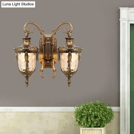 Farmhouse Style Wall Sconce With Dimpled Glass Shade And Scrolled Arms - Iron Black/Bronze 2 Lights