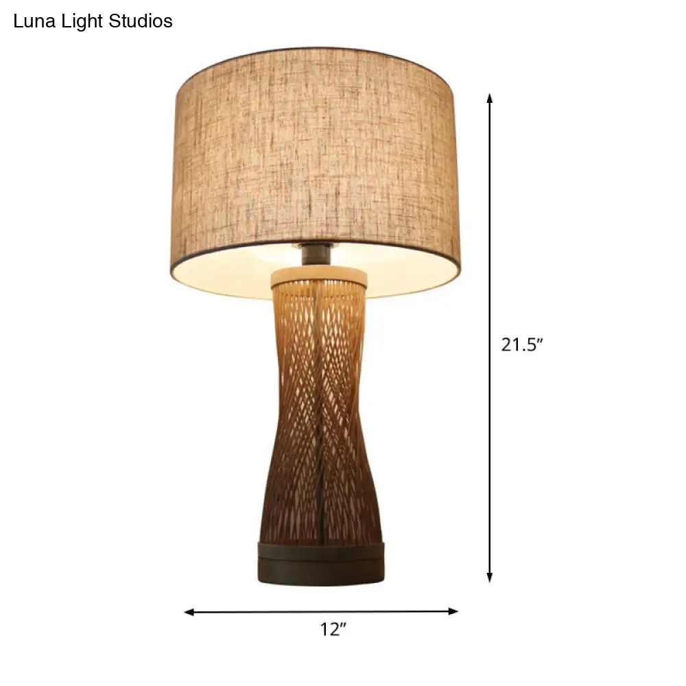 Flaxen Laser Cut Bamboo Desk Lamp With Asian-Inspired Design And Fabric Drum Shade