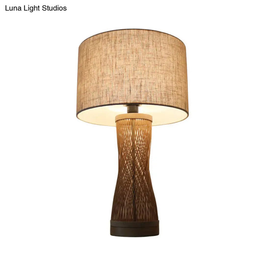 Flaxen Laser Cut Bamboo Desk Lamp With Asian-Inspired Design And Fabric Drum Shade