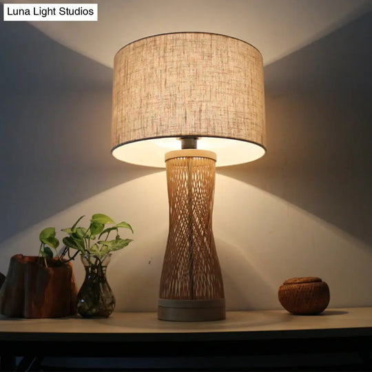 Flaxen Laser Cut Bamboo Desk Lamp With Asian-Inspired Design And Fabric Drum Shade