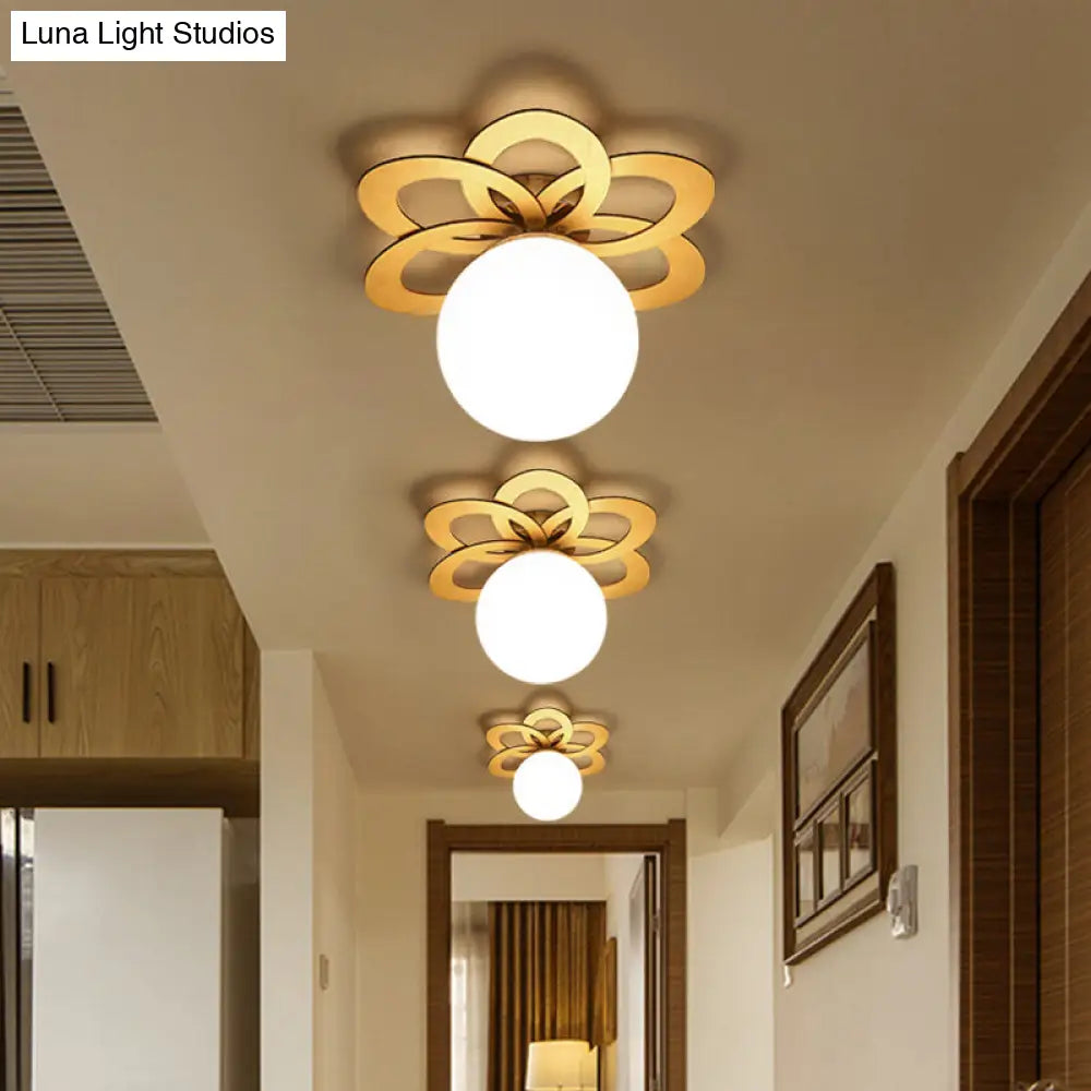 Frosted Glass Orb Ceiling Light With Modern Gold Flower Canopy