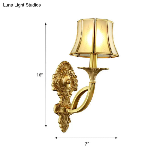 Frosted Glass Wall Sconce With Brass Paneled Bell And Scrolled Arm For Traditional Living Room Décor