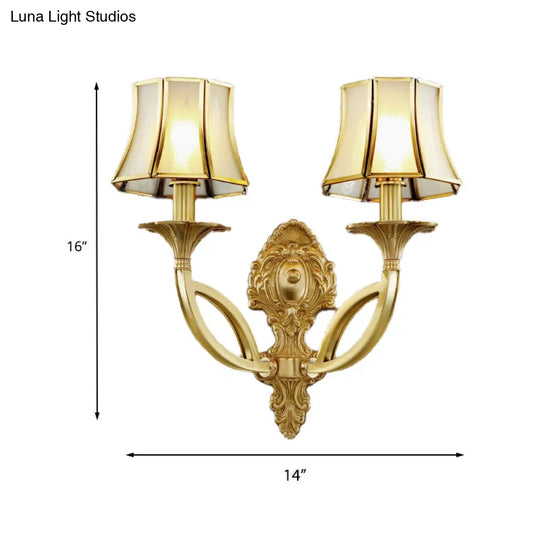 Frosted Glass Wall Sconce With Brass Paneled Bell And Scrolled Arm For Traditional Living Room Décor