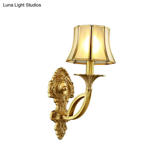 Frosted Glass Wall Sconce With Brass Paneled Bell And Scrolled Arm For Traditional Living Room Décor