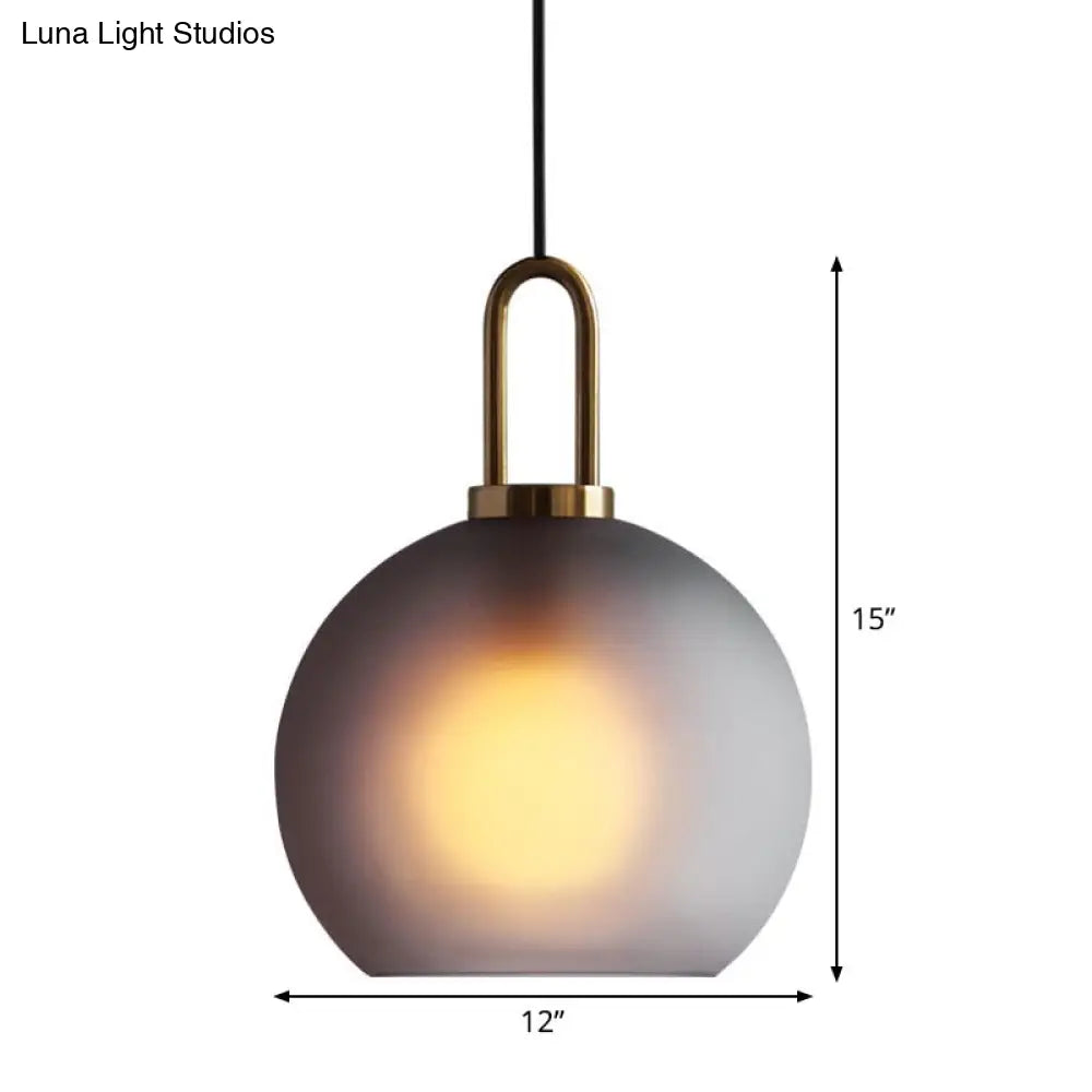 Modern Glass Sphere Pendant Light With Smoky Grey Frosted Finish Single-Bulb Brass Ceiling Hanging