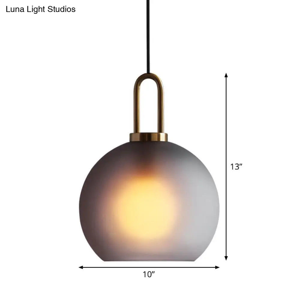 Modern Glass Sphere Pendant Light With Smoky Grey Frosted Finish Single-Bulb Brass Ceiling Hanging