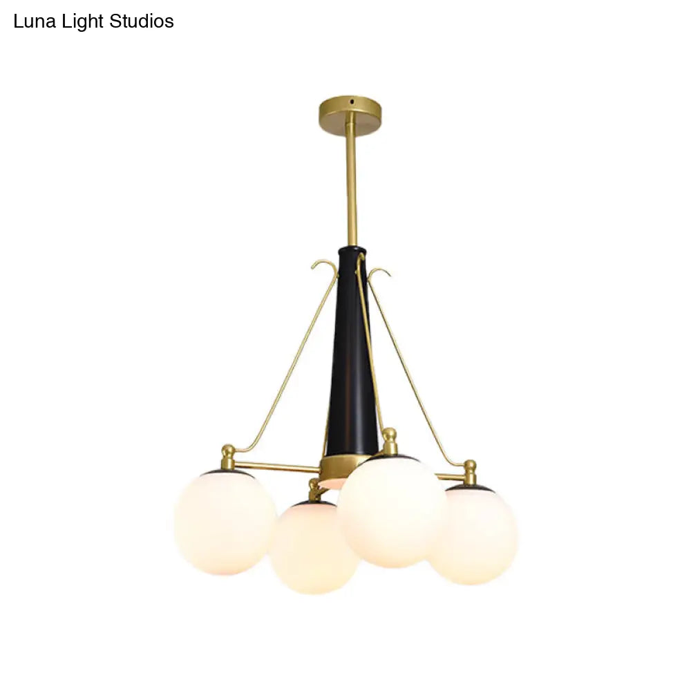 Modern Frosted White Glass Pendant Chandelier With 4 Brass And Black Hanging Heads