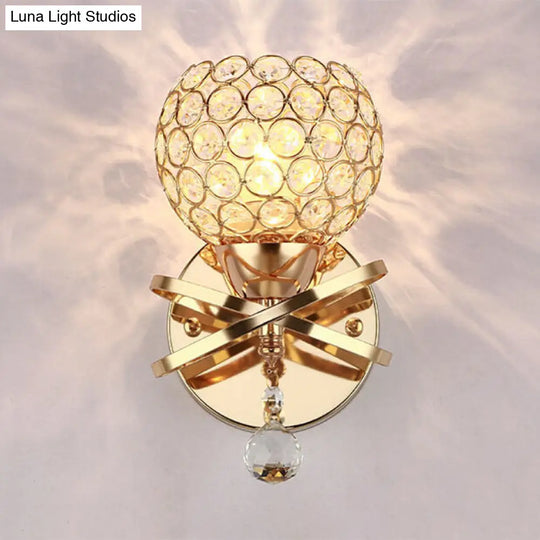 Globe Cutout Metal Shade Crystal Wall Sconce In Gold With Dropped Ball Accent