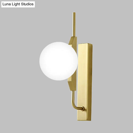 Globe Living Room Sconce - Frosted White Glass Modern Wall Light With Gold Backplate