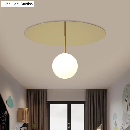 Gold Ceiling Mount Semi Flush Light With Cream Glass Ball And Disc Canopy
