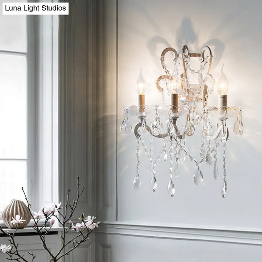 Gold & Distressed White Metal Wall Mounted Sconce With Crystal Accent - 3-Light Lodge Swooping Arm