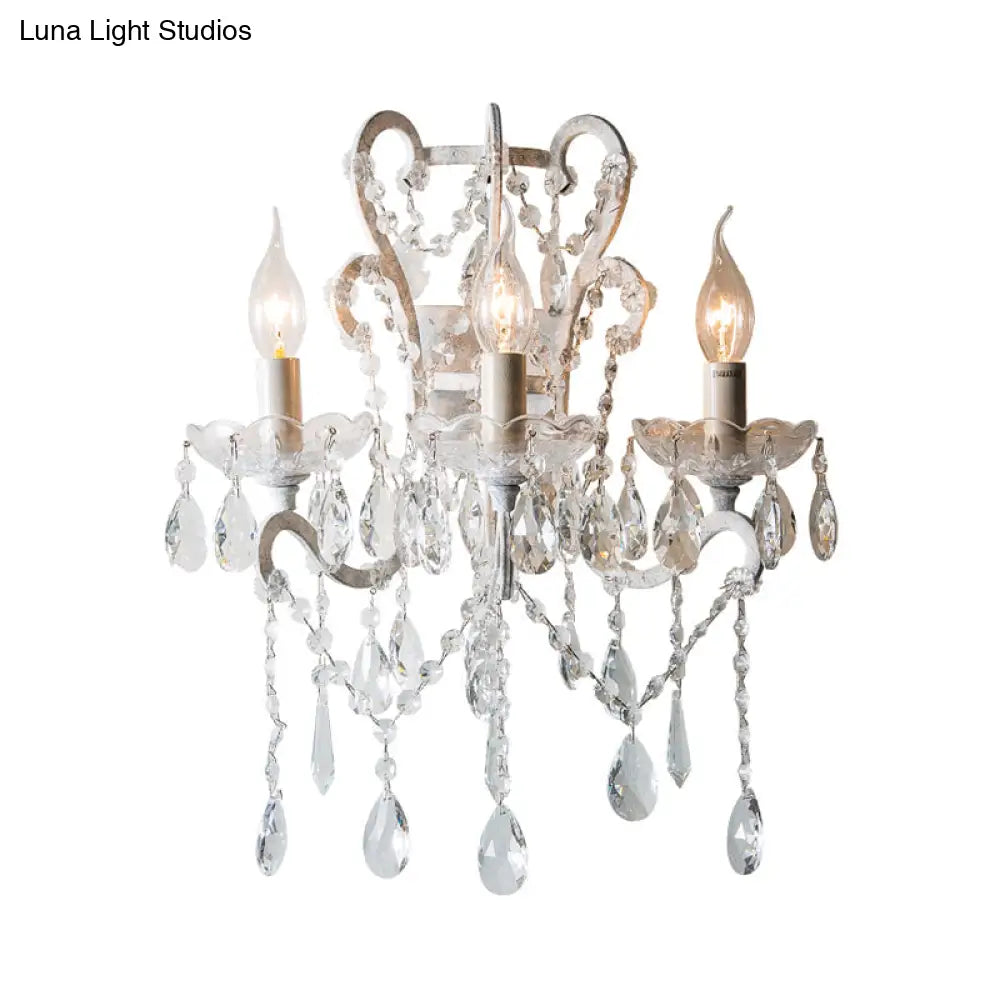 Gold & Distressed White Metal Wall Mounted Sconce With Crystal Accent - 3-Light Lodge Swooping Arm