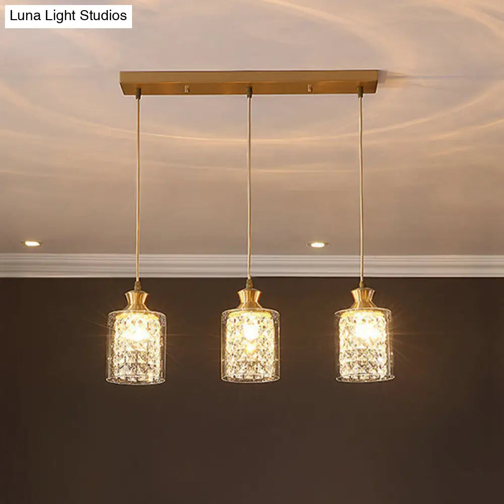 Modernist Gold Pendant Lamp With Faceted Crystal And Clear Glass Shade - 3 Heads