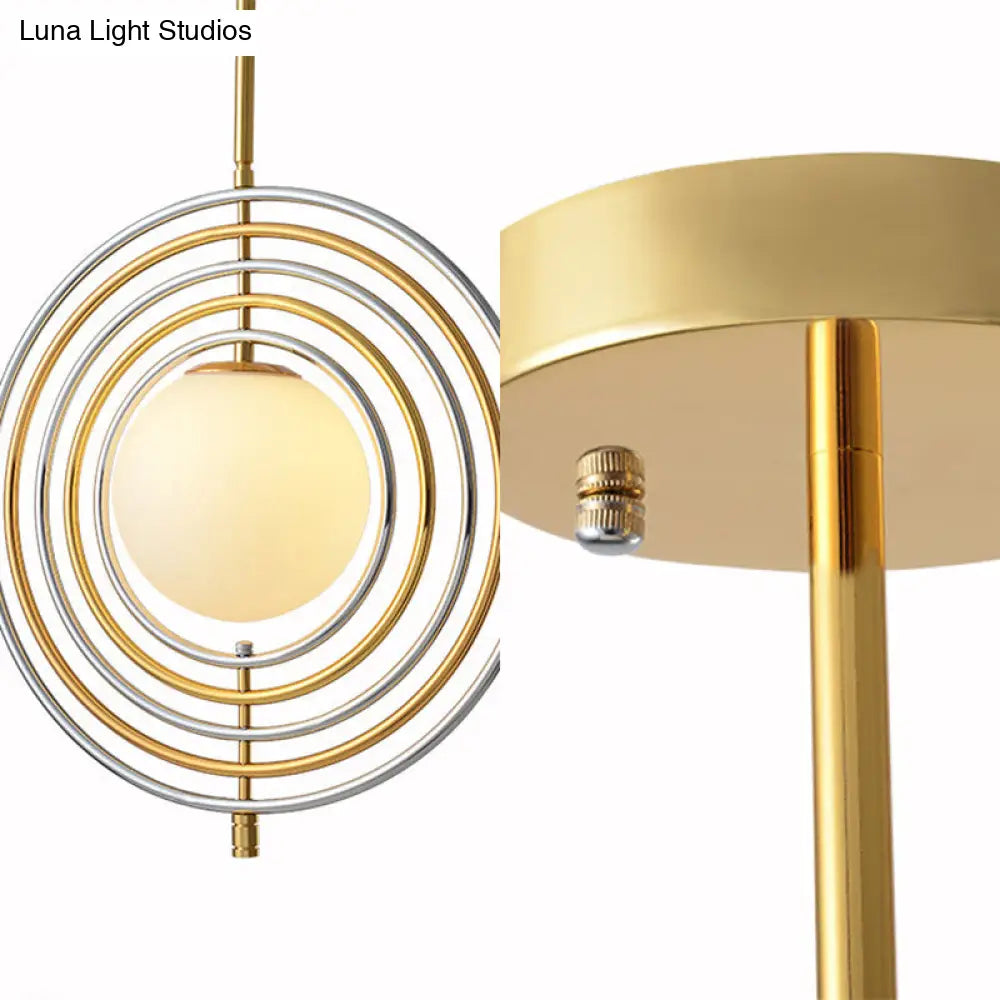 Modern Gold Frosted Glass Orbit Pendant Light With Concentric Rings - Dining Room Hanging