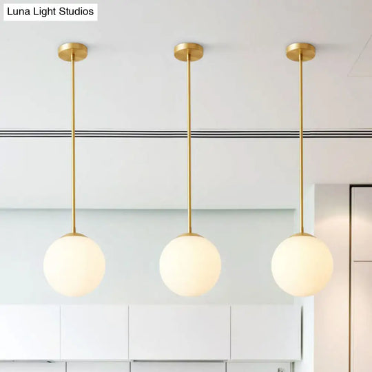 Gold Globe Pendant Light - Cream Glass 1-Light Simplicity Hanging Fixture