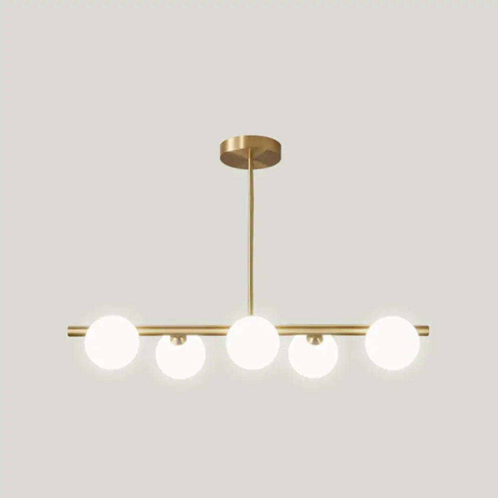 Gold Linear Island Pendant Light With Spherical Glass Shade - Perfect For Dining Table And