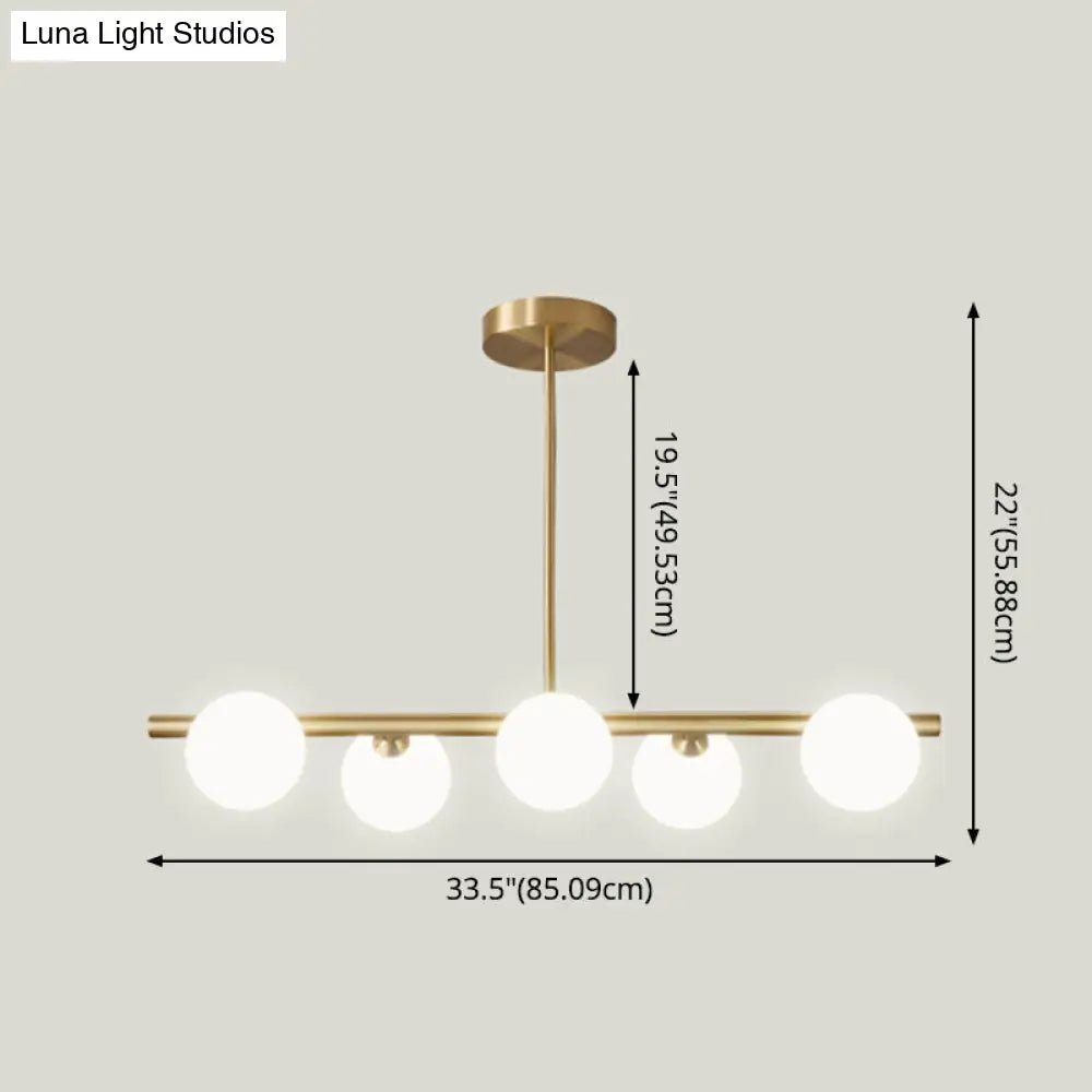 Gold Linear Island Pendant Light With Spherical Glass Shade - Perfect For Dining Table And