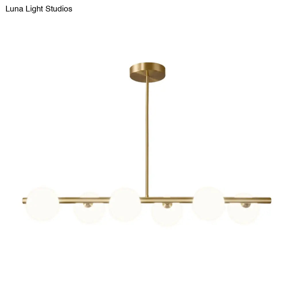 Gold Linear Island Pendant Light With Spherical Glass Shade - Perfect For Dining Table And