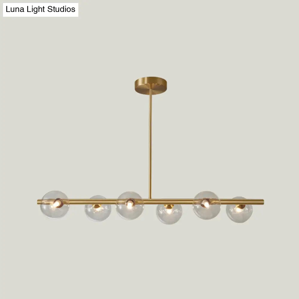 Linear Gold Pendant Light With Spherical Glass For Modern Minimalist Dining Table 6 / Clear