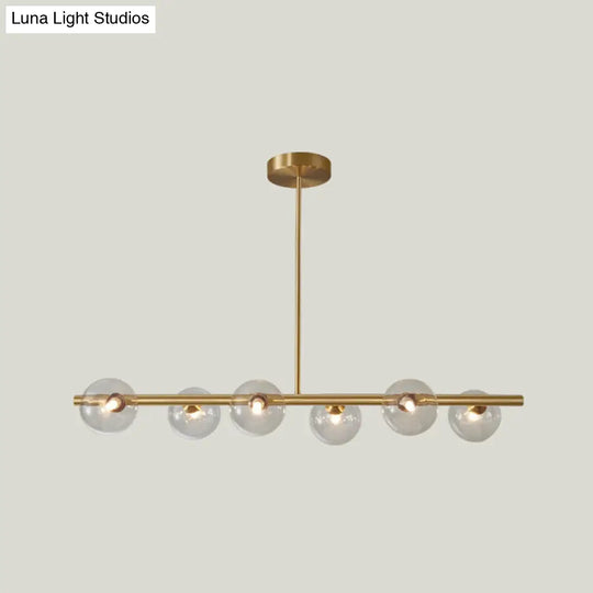 Linear Gold Pendant Light With Spherical Glass For Modern Minimalist Dining Table 6 / Clear