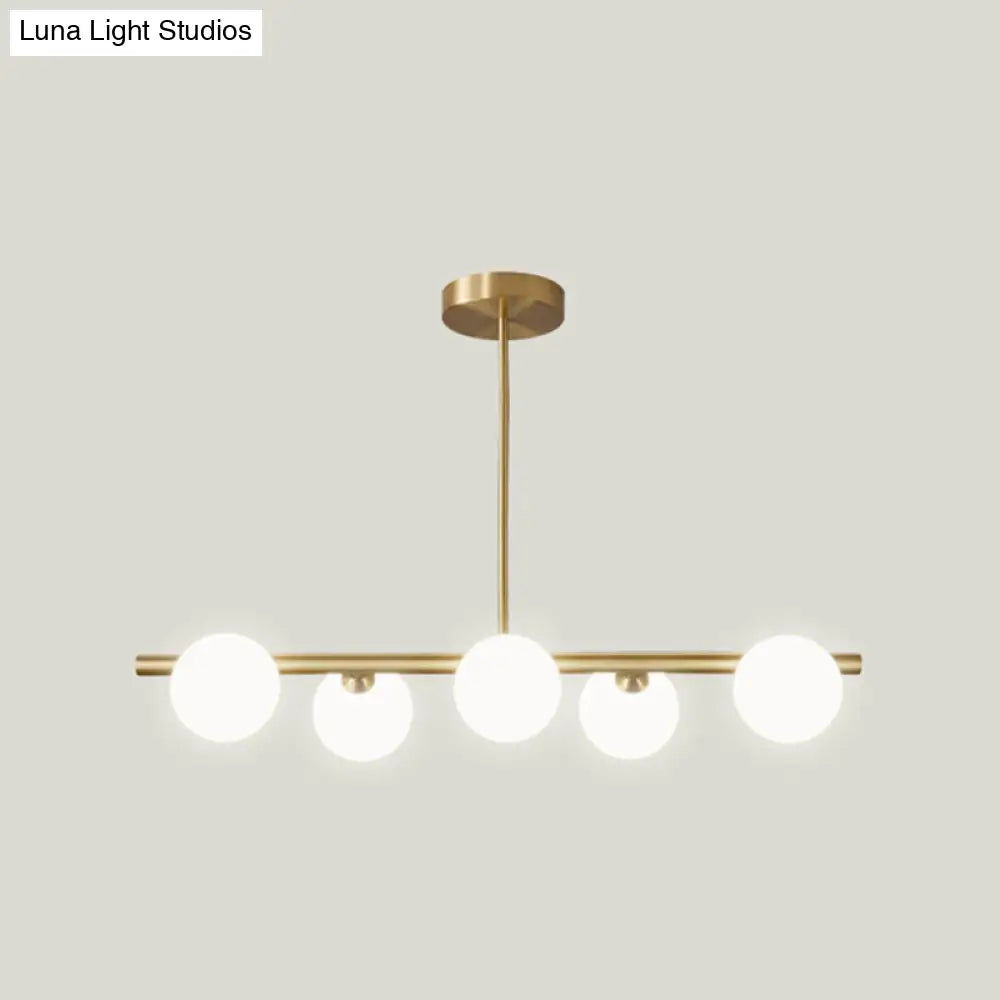 Linear Gold Pendant Light With Spherical Glass For Modern Minimalist Dining Table 5 / Cream