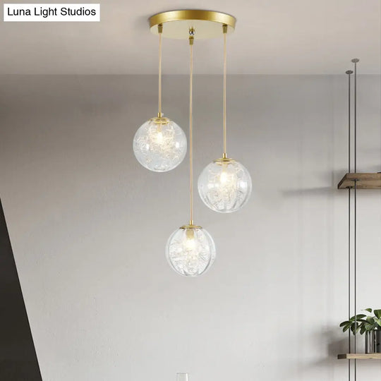 Minimalist Pumpkin Ball Pendant Light - Clear Glass 3 Lights Gold Finish Metal Line Deco