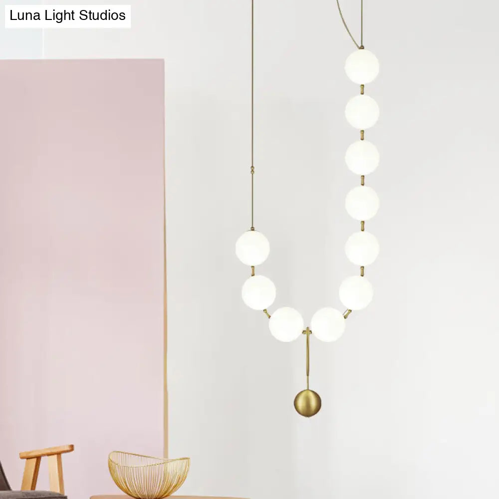 Gold Milk Glass Chandelier With Necklace-Shaped Dining Table Design - 10 Lights Simple Hanging Light