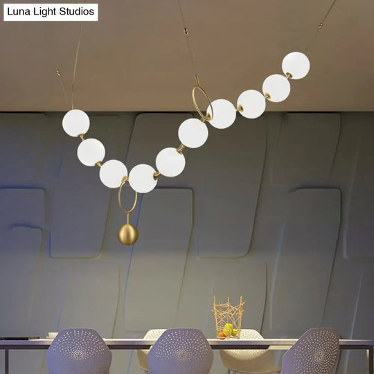 Gold Milk Glass Chandelier With Necklace-Shaped Dining Table Design - 10 Lights Simple Hanging Light