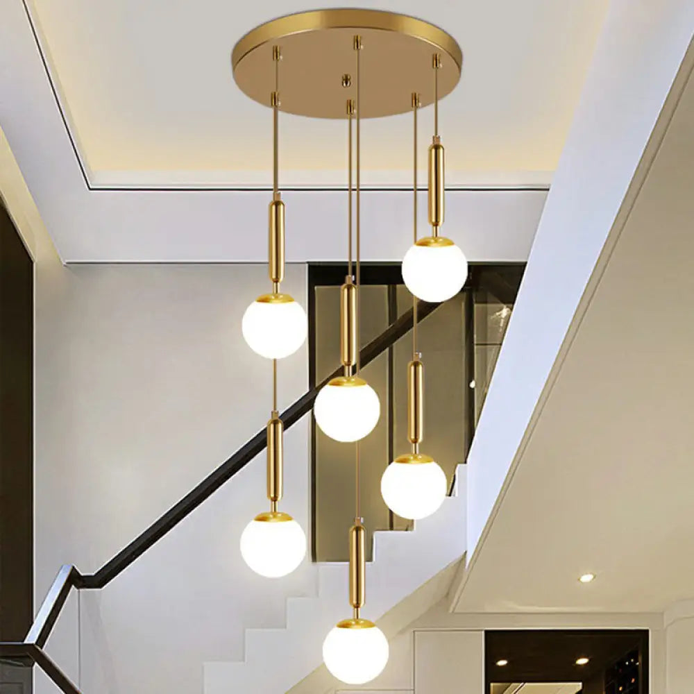 Gold Multi Hanging Stairway Light With Minimalist White Glass Ball Pendant 6 / Globe