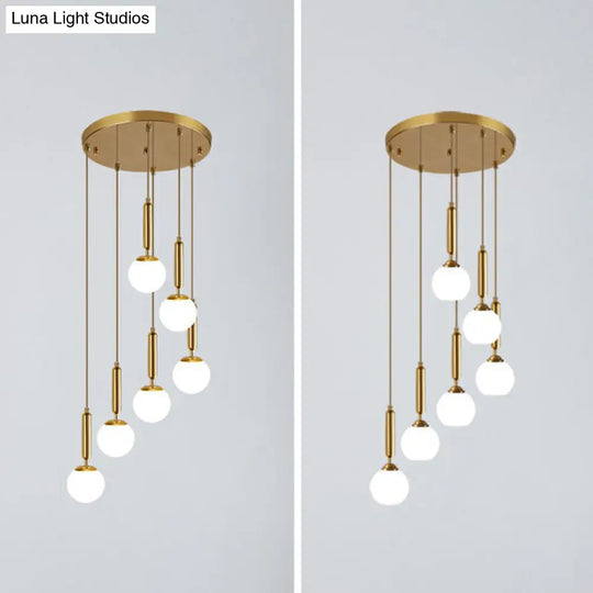 Gold Minimalist Stairway Pendant Light With White Glass Ball Multi Hanging