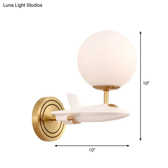 Gold Spaceship Wall Sconce With Cream Glass Globe For Kids Room - 1/2 Bulb Fixture In White &