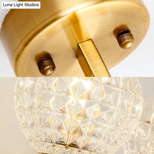 Golden Clean-Lined 1-Light Wall Lamp With Clear Grid Glass Shade For Elegant Hallways