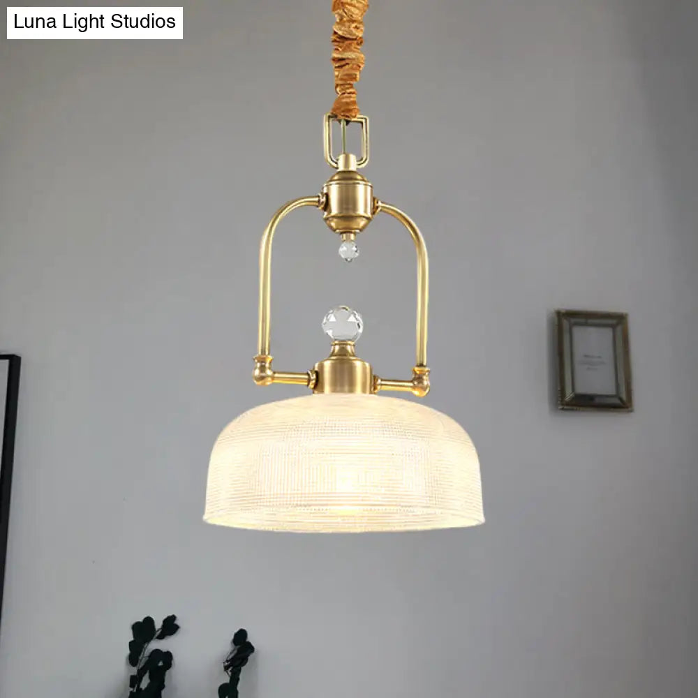 Golden Traditional Pendant Light With Clear Prismatic Glass Shade And Metal Suspension