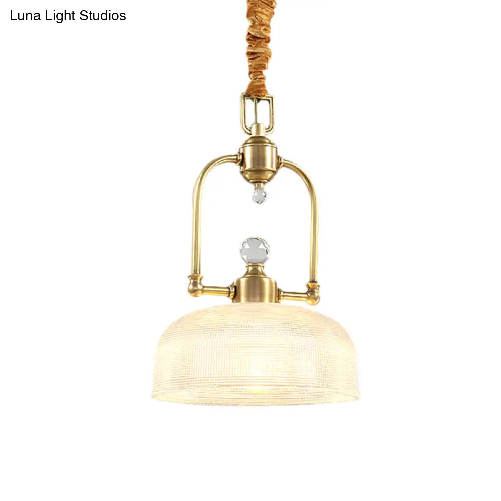 Golden Traditional Pendant Light With Clear Prismatic Glass Shade And Metal Suspension