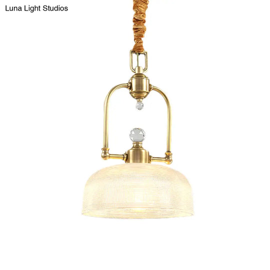 Golden Traditional Pendant Light With Clear Prismatic Glass Shade And Metal Suspension