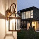 House Shaped Wall Mount Light With Clear Glass Ideal For Courtyard Bronze