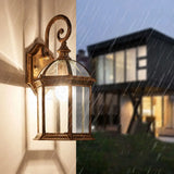House Shaped Wall Mount Light With Clear Glass Ideal For Courtyard Bronze