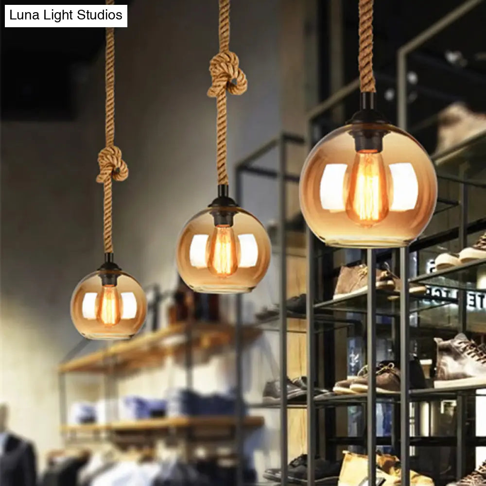 Industrial 1-Light Wide Globe Pendant Lighting - Clear/Amber Glass Hanging Lamp