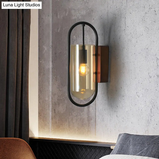 Industrial Black Cylinder Sconce Lighting - Clear/Amber Glass Wall Mount Fixture