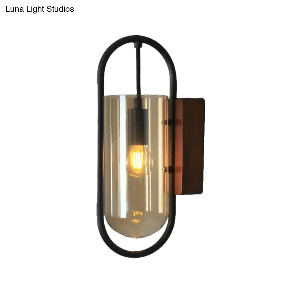 Industrial Black Cylinder Sconce Lighting - Clear/Amber Glass Wall Mount Fixture