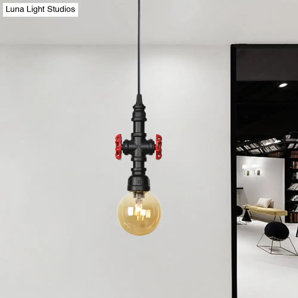 Industrial Black Finish Amber Glass Pendant Lamp With Pipe Suspension - 1-Light Ball/Capsule