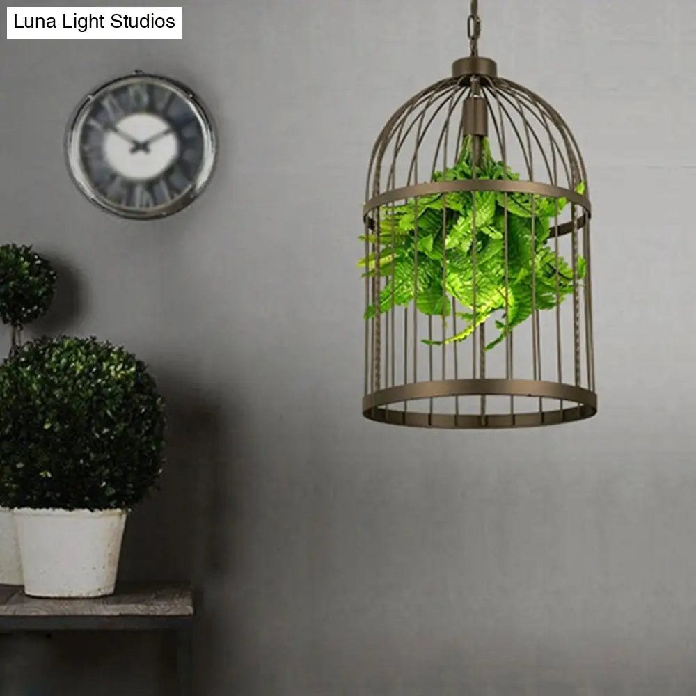 Industrial Black Iron Birdcage Pendant Lamp With Single Bulb And Artificial Plant Décor