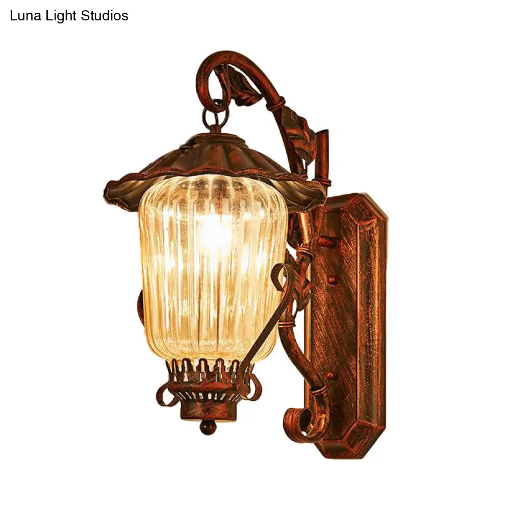 Industrial Black Lantern Wall Sconce Light With Ribbed Glass And Weathered Copper Finish - Bedroom